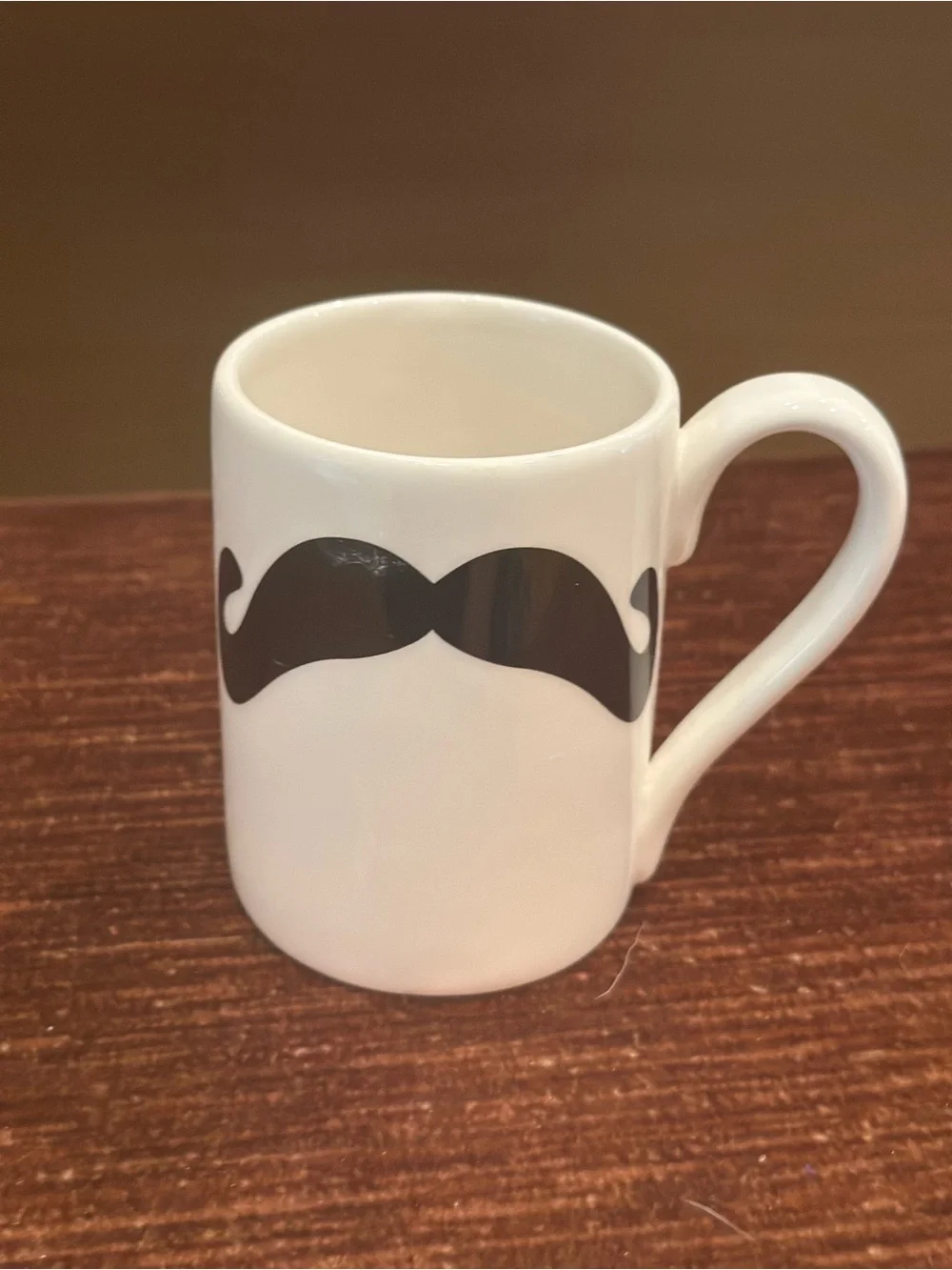 Claire's White Ceramic Mug with Black Mustache Design